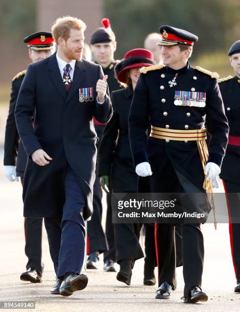 Prince Harry accompanied by Major General Paul Nanson attends The Sovereign's Parade at the Royal Military Academy Sandhurst on December 15, 2017 in...