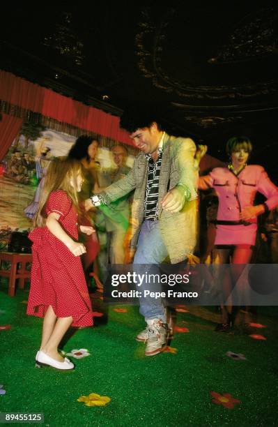 Première of Almodovar´s 'High Heels' The film director dancing with a girl in the party after the première of his film 'High Heels'