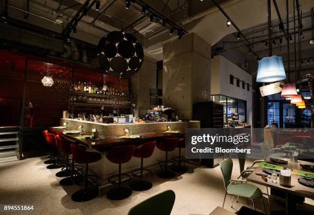 Tables and chairs stand inside Pavilion, a restaurant operated by Smiles Co., in Tokyo, Japan, on Tuesday, Jan. 24, 2017. Masamichi Toyama, former...