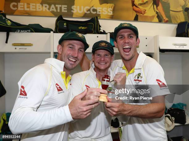 Shaun Marsh, Steve Smith and Mitch Marsh of Australia celebrate in the changerooms after Australia regained the Ashes during day five of the Third...