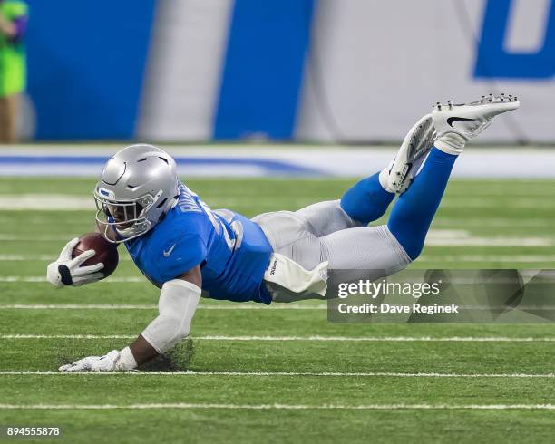 Theo Riddick of the Detroit Lions is tackled by Trae Waynes of the Minnesota Vikings during an NFL game at Ford Field on November 23, 2016 in...