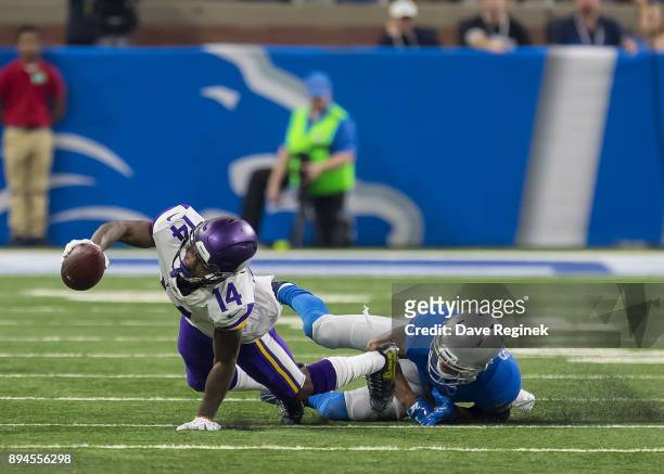 Stefon Diggs of the Minnesota Vikings is tackled by Darius Slay of the Detroit Lions during an NFL game at Ford Field on November 23, 2016 in...
