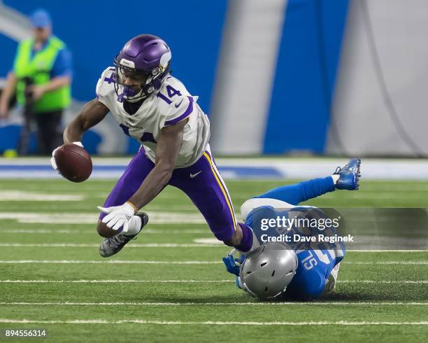 Stefon Diggs of the Minnesota Vikings is tackled by Darius Slay of the Detroit Lions during an NFL game at Ford Field on November 23, 2016 in...