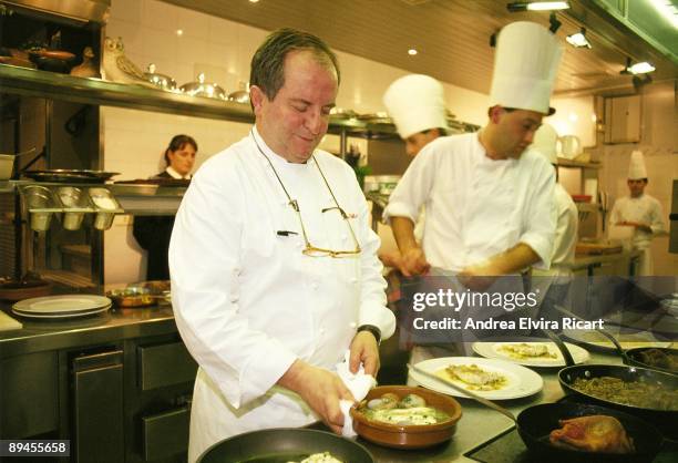 Juan Mari Arzak cook Arzak with his cooks in the kitchen of his restaurant