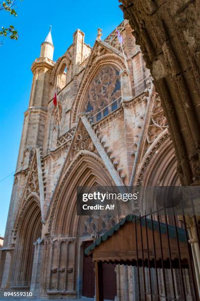 main facade of st. nicholas cathedral or lala mustafa mosque in famagusta, cyprus - st nicholas cathedral stock-fotos und bilder
