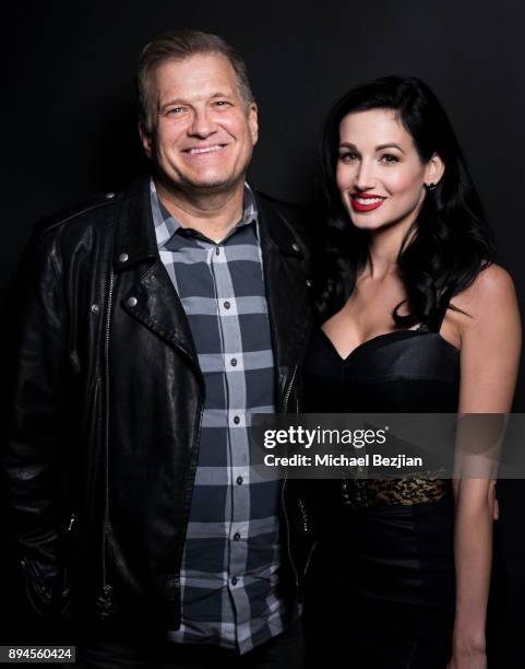 Drew Carey and Amie Harwick pose for The Artists Project at Rock To Recovery 5th Anniversary Holiday Party at Avalon on December 17, 2017 in...