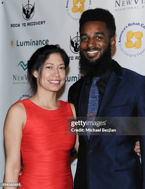 Anthony Pearson and guest attend Rock To Recovery 5th Anniversary Holiday Party at Avalon on December 17, 2017 in Hollywood, California.