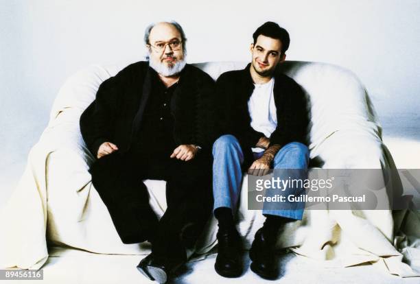 Jose Luis Cuerda and Alejandro Amenabar, film directors Sat on an armchair