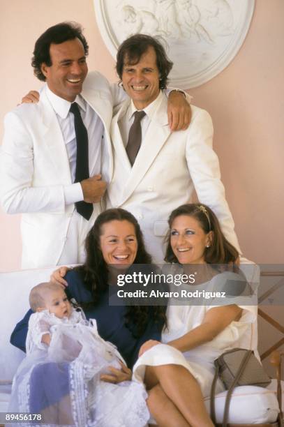 Julio Iglesias with Manuel Benitez 'El Cordobes' and wife Julio Iglesias, Manuel Benitez, his wife, his son and the godmother of his son