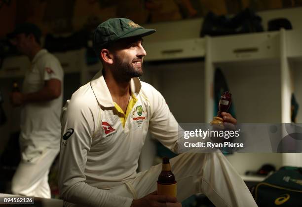 Nathan Lyon celebrates in the changerooms after Australia regained the Ashes during day five of the Third Test match during the 2017/18 Ashes Series...