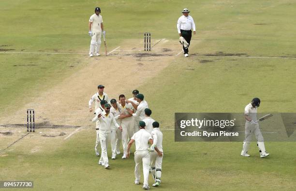 Josh Hazlewood of Australia celebrates after taking the wicket of Dawid Malan of England during day five of the Third Test match during the 2017/18...