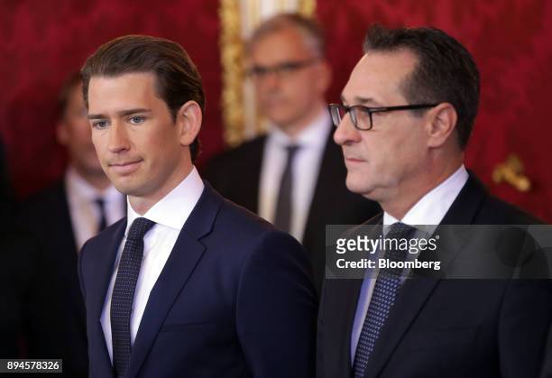 Sebastian Kurz, Austria's chancellor, left, and Heinz-Christian Strache, Austria's vice chancellor, look on during the inauguration of the new...