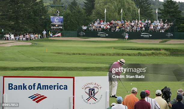 Tom Kite hits from the 17th tee box during the first round of the Bank of America Championship at Nashawtuc Country Club held on June 20, 2008 in...