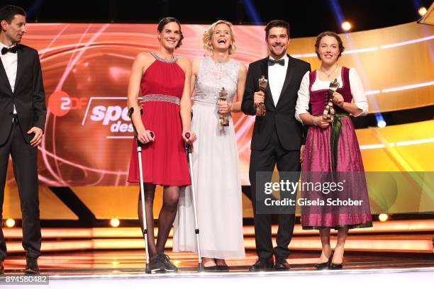 Kira Walkenhorst and her beach volleyball team mate Laura Ludwig, Johannes Rydzek and Laura Dahlmeier with award during the 'Sportler des Jahres...