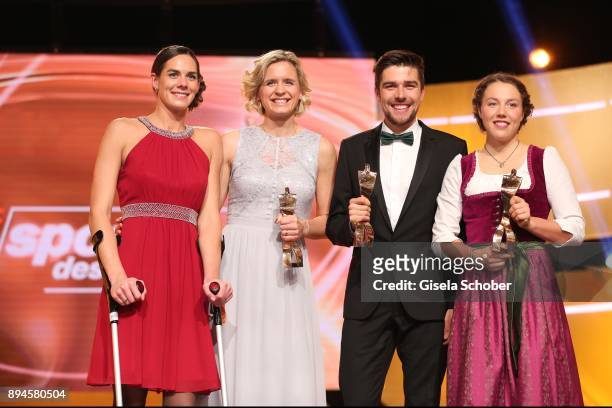 Kira Walkenhorst and her beach volleyball team mate Laura Ludwig, Johannes Rydzek and Laura Dahlmeier with award during the 'Sportler des Jahres...
