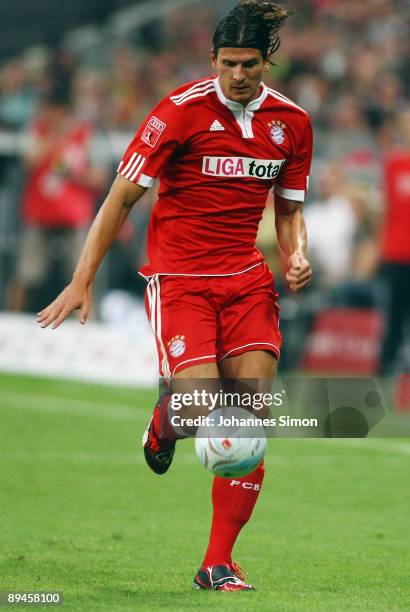 Mario Gomez of Bayern in action during the Audi Cup tournament semi final match between FC Bayern Muenchen and AC Milan at Allianz Arena on July 29,...