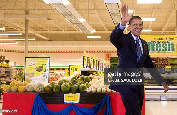 President Barack Obama arrives for a town hall meeting on healthcare reform at Kroger's Supermarket in Bristol, Virginia, July 29, 2009. Obama is...