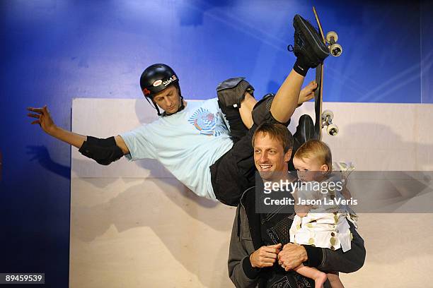 Tony Hawk and his daughter Kadence Clover Hawk attend Tony Hawk's wax figure unveiling ceremony at Madame Tussauds on July 29, 2009 in Hollywood,...