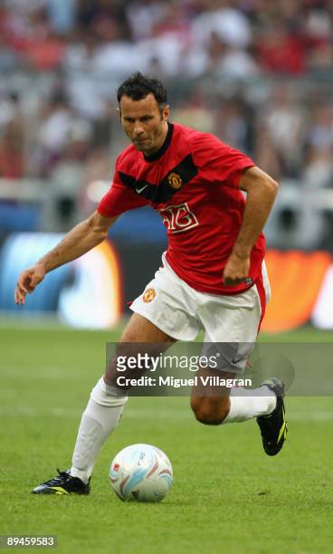 Ryan Giggs of Manchester plays the ball during the Audi Cup tournament semi final match between Boca Juniors v Manchester United at Allianz Arena on...