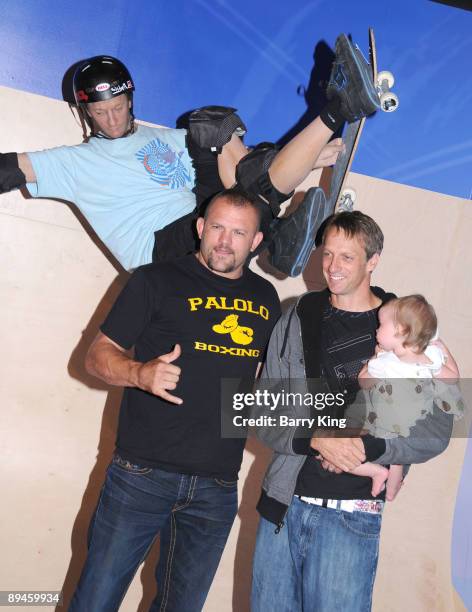 Ultimate Fighting Champion Chuck Liddell, former professional skateboarder Tony Hawk and his daughter Kadence Clover Hawk attend the unveiling of...