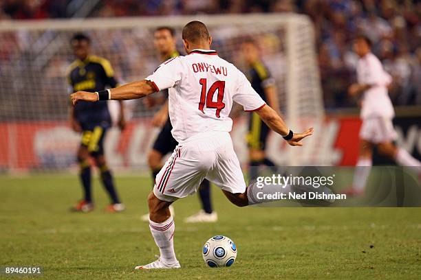 Oguchi Onyewu of AC Milan passes the ball against Chelsea FC at M & T Bank Stadium on July 24, 2009 in Baltimore, Maryland.