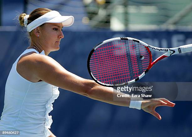 Nadia Petrova of Russia tosses her racket during her loss to Maria Sharapova of Russia on Day 3 of the Bank of the West Classic at Stanford...