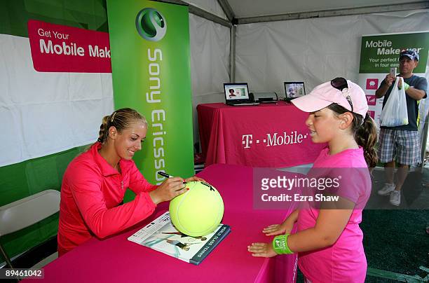 Sabine Lisicki of Germany signs autographs on Day 3 of the Bank of the West Classic at Stanford University on July 29, 2009 in Stanford, California.