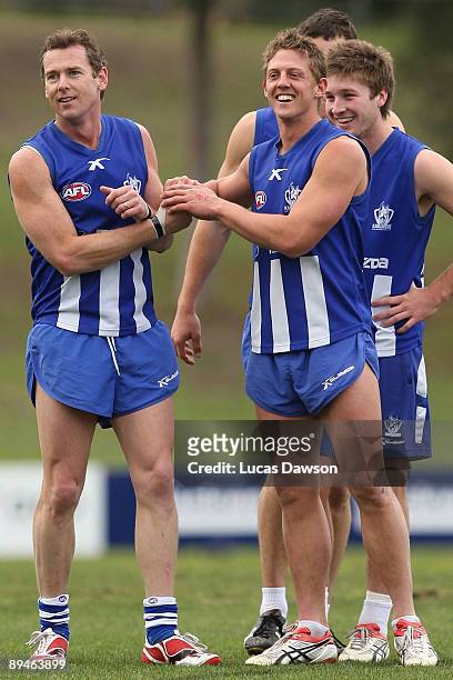 Adam Simpson and Daniel Harris of the Kangaroos in action during a North Melbourne Kangaroos AFL training session held at Arden Street on July 30,...