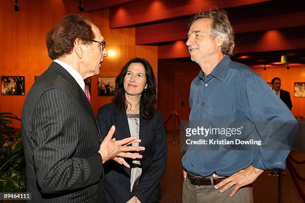 Philip Berk, president of the Hollywood Foreign Press Association; Margaret Bodde, director of The Film Foundation and Director Curtis Hanson attend...