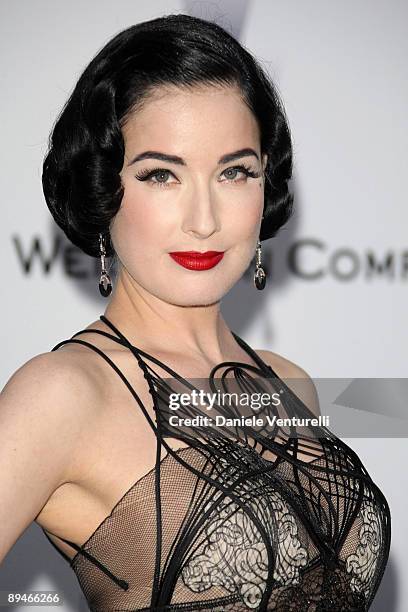 Burlesque artist Dita Von Teese attends the amfAR Cinema Against AIDS 2009 benefit at the Hotel du Cap during the 62nd Annual Cannes Film Festival on...