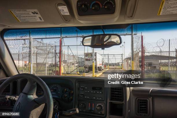 Driving into a maximum security wing at Angola Prison. The Louisiana State Penitentiary, also known as Angola, and nicknamed the "Alcatraz of the...