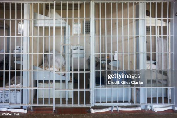 Prison cells inside Angola Prison The Louisiana State Penitentiary, also known as Angola, and nicknamed the "Alcatraz of the South" and "The Farm" is...