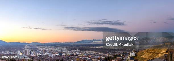 panoramic view of salt lake city at dawn - utah skyline stock pictures, royalty-free photos & images