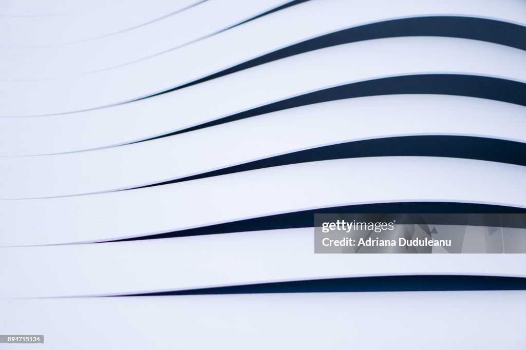 Full Frame Of Curved Lines On Modern Building
