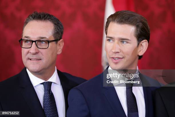 Heinz-Christian Strache, Austria's vice chancellor, left, and Sebastian Kurz, Austria's chancellor, pose for photographs during the inauguration of...