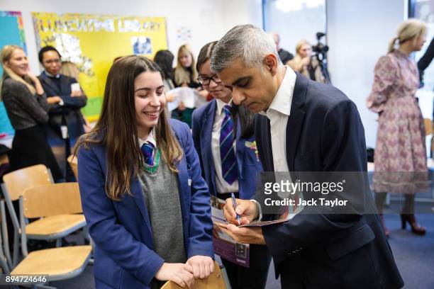 London Mayor Sadiq Khan signs an autograph as he attends an equality workshop with pupils at Platanos College to mark the launch of his campaign to...
