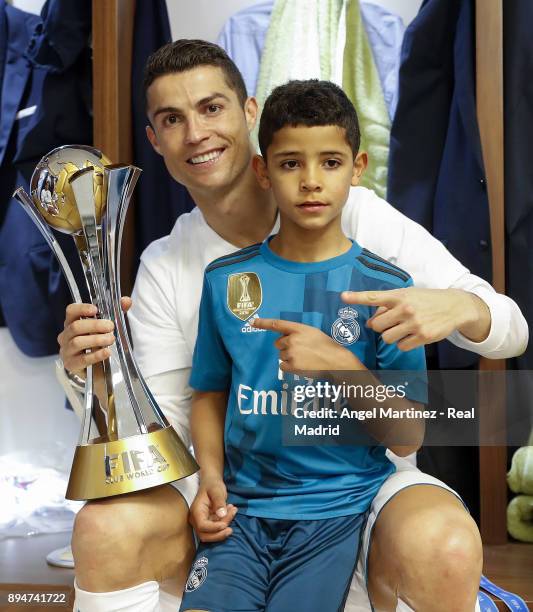 Cristiano Ronaldo of Real Madrid pose with his son after the FIFA Club World Cup UAE 2017 Final match between Real Madrid CF and Gremio FBPA at Zayed...