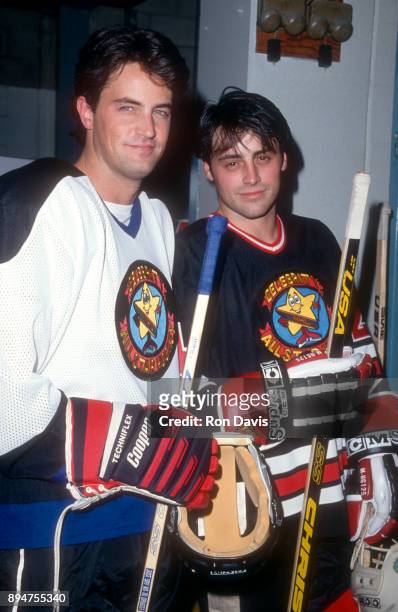 Canadian-American actor Matthew Perry and American actor Matt LeBlanc pose for a portrait during the Homeless 4 Hockey Charity event on December 14,...