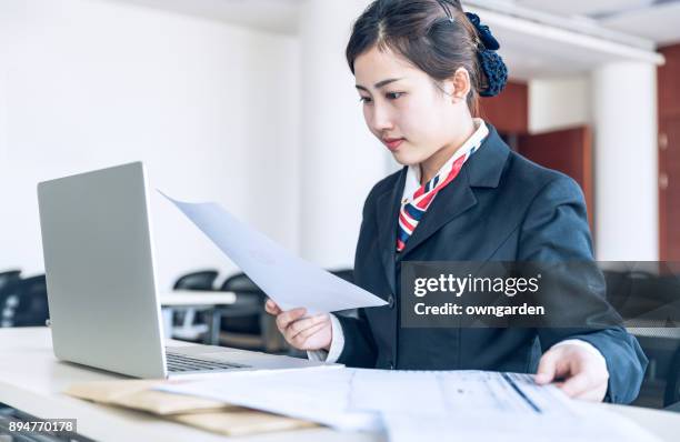bank teller - chinese bank teller stock pictures, royalty-free photos & images