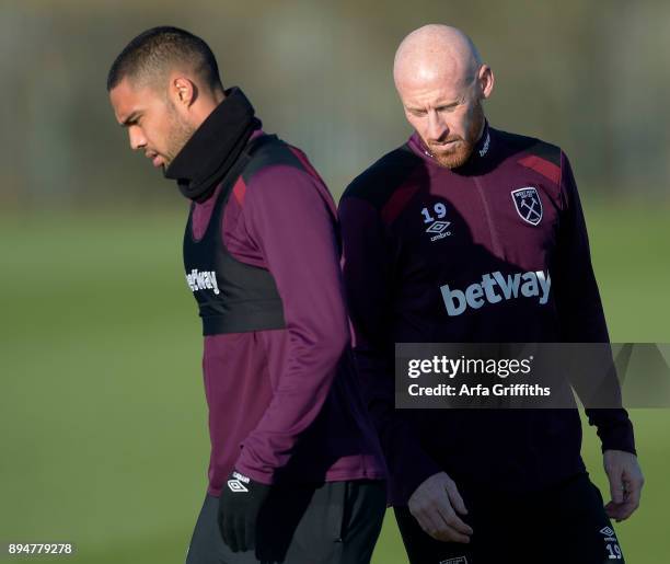 Winston Reid and James Collins of West Ham United during Training at Rush Green on December 18, 2017 in Romford, England.