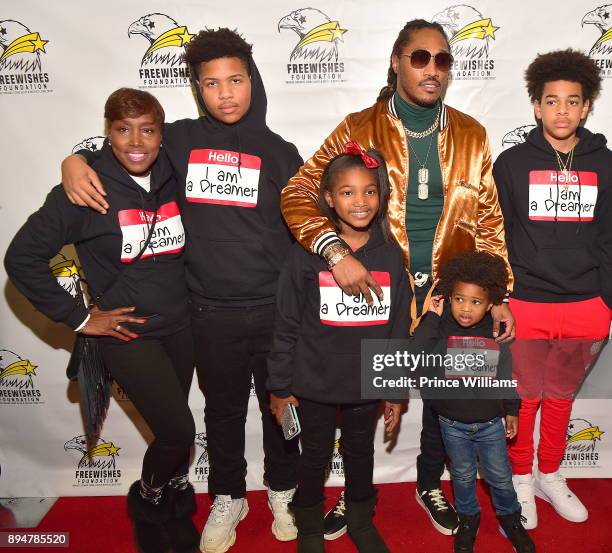 Stephanie Jester, future and his Children attend the 5th annual FreeWishes Winter Wish Land at Bessie Branham Park on December 17, 2017 in Atlanta,...