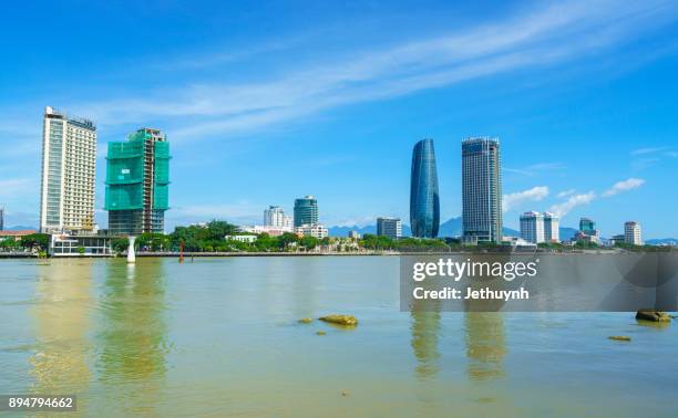 view of da nang city riverside cityscape with blue sky - apec 2017 stockfoto's en -beelden