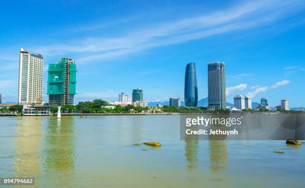 view of da nang city riverside cityscape with blue sky - apec 2017 stock pictures, royalty-free photos & images
