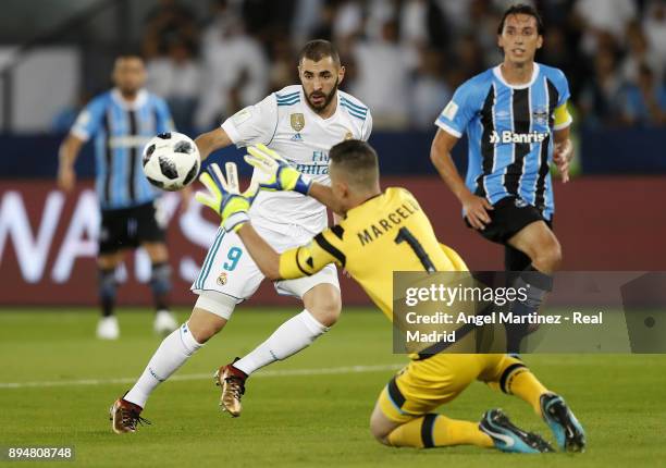 Marcelo Grohe of Gremio saves a ball from Karim Benzema of Real Madrid during the FIFA Club World Cup UAE 2017 Final match between Real Madrid CF and...