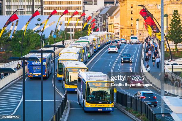 rush hour bus congestion on victoria bridge in brisbane, queensland - brisbane sign stock pictures, royalty-free photos & images