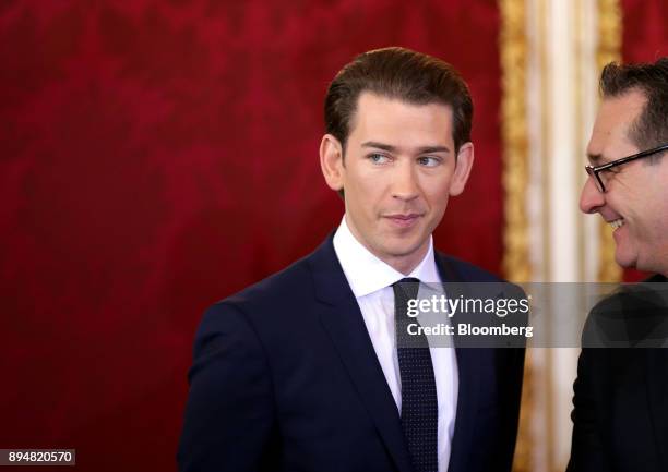 Sebastian Kurz, Austria's chancellor, left, and Heinz-Christian Strache, Austria's vice chancellor, look on during the inauguration of the new...