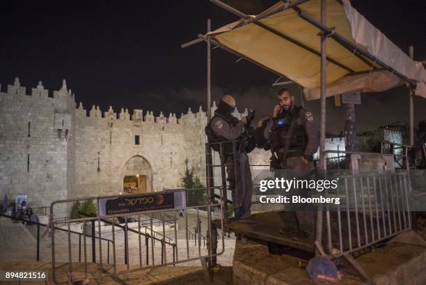 Israeli Border Police, also known as Magnaviki, man a security post outside the Damascus Gate, one of the main entrances into the Old City, in...