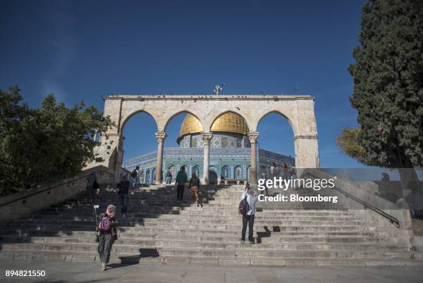 Visitors approach the entrance to the Dome of The Rock on Temple Mount in the Old City in Jerusalem, Israel, on Sunday, Dec. 17, 2017. The United...