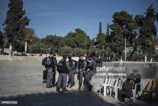 Members of the Jerusalem Waqf department police force stand by the Al-Aqsa Mosque on the Temple Mount in the Old City in Jerusalem, Israel, on...