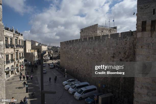 Pedestrians pass the Jaffa Gate entrance to the Old City in Jerusalem, Israel, on Thursday, Dec. 14, 2017. The United Nations Security Council is...